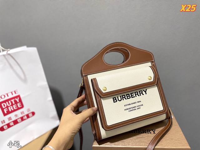 礼盒包装 Ddd Burberry 新品 一包难求的帆布包包目博柏利burberry这一季的帆布系列简直太好看米白色帆布和有质感的棕色羊皮拼接复古又不失休闲感而