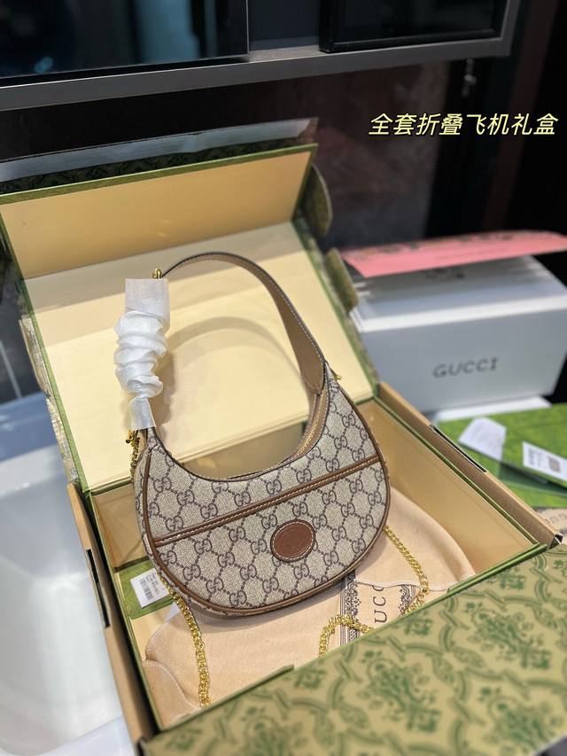 折叠飞机 Gucci古驰.上新啦新款gucci古驰月牙包新款gucci吉驰月牙包乌木色 上新啦c