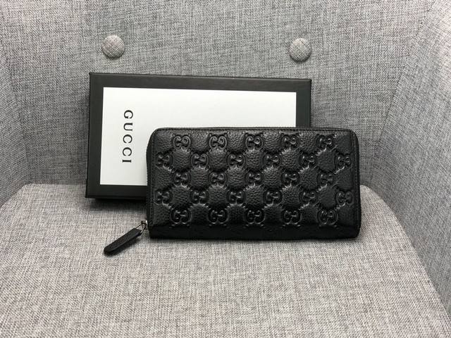 产品名称 Gucci 产品型号 6903 产品品质 原版 产品材质 进口牛皮 产品规格 19.5*10*2.5 产品颜 色 黑色 产品描 述 最新爆款男女通用钱