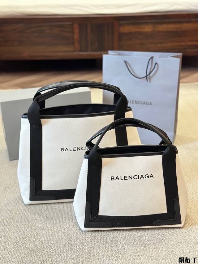 Balenciaga 巴黎世家navy Cabas 沙滩 超多网红博主们推荐 牛皮 帆布材质 包包非常耐用 包包本身自重轻 向单肩司手提 尺寸 大号40 31C