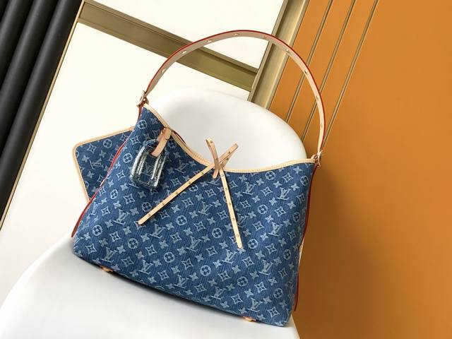 顶级原单 M46855 蓝色 丹宁牛仔 推出崭新 Carryall 中号手袋，以 Monogram 帆布和皮革饰边塑造贴合身形的设计。充裕空间内设拉链袋，可拆卸 - 点击图像关闭