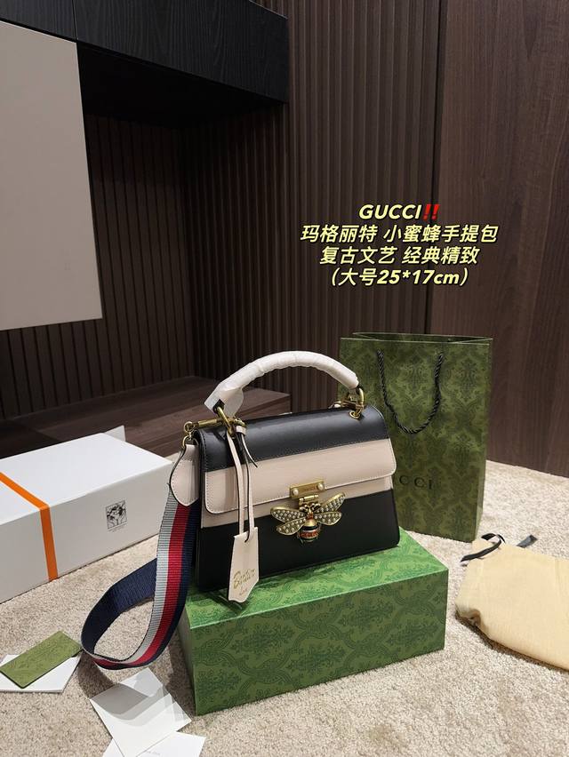 配折叠盒尺寸25.17 酷奇 Gucci 玛格丽特小蜜蜂手提包 玛格丽特蜂蜜手提包 70年代典藏设计的蜜蜂造型锁扣 镶嵌玻璃珍珠和彩色水晶 蜜蜂珍珠元素相结合满