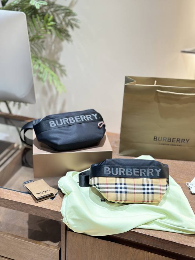 Burberry大logo宽肩带腰包 由包包名称: Burberry徽标装饰大logo时尚宽肩带腰包害 腰包内空间还是蛮大的计 ◆日常出行装充电宝数据线足够使用